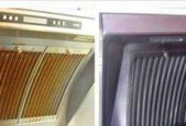 现代环保油烟机清洗方法（轻松清除油烟困扰）