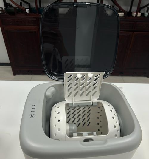洗衣机白色翻盖的用途是什么？  第1张